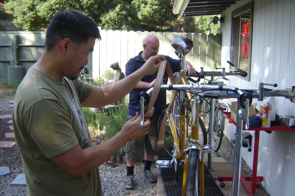 Eric and Chris building bicycles for Lars and Phil