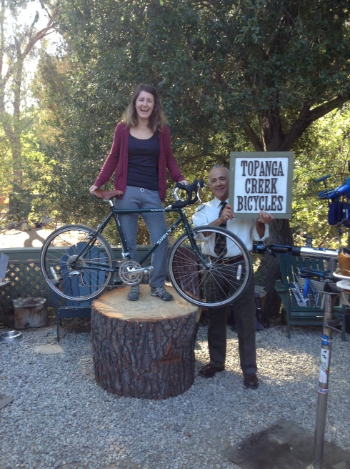 Chelsy is going to commute and the Surly Long Haul Trucker was her ideal bike. Here she is with it. Seems that being nice works. She said she was on to us, that we wanted to make her happy. Ouch, our secret is out. Well, seeing her enjoy the bike made us happy, so I guess we are even.